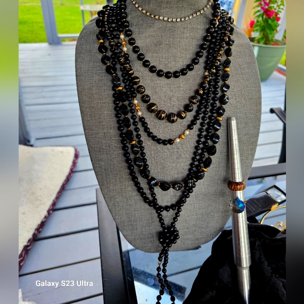 Bundle of vintage black and goldtone beaded . 1 rinestone necklaces. 2 Rings